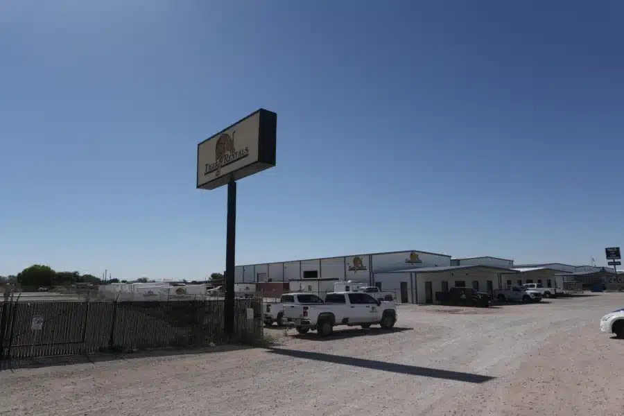 The Tiger Safety Rentals yard and pole sign in Midland, Texas