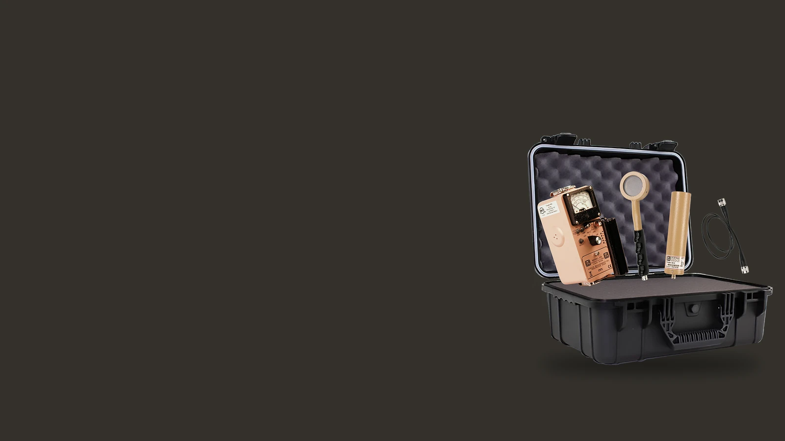 Ludlum Model 3-IS NORM kit open in its case on a dark background