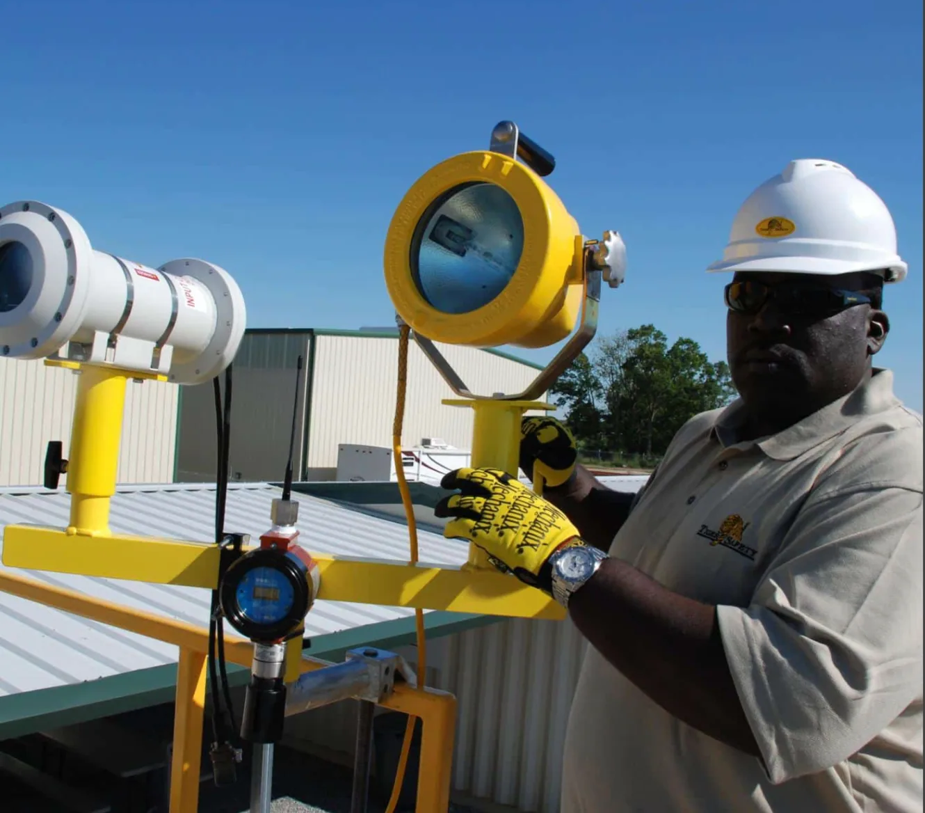 Tiger Safety technician servicing navigational aid lighting equipment in the field