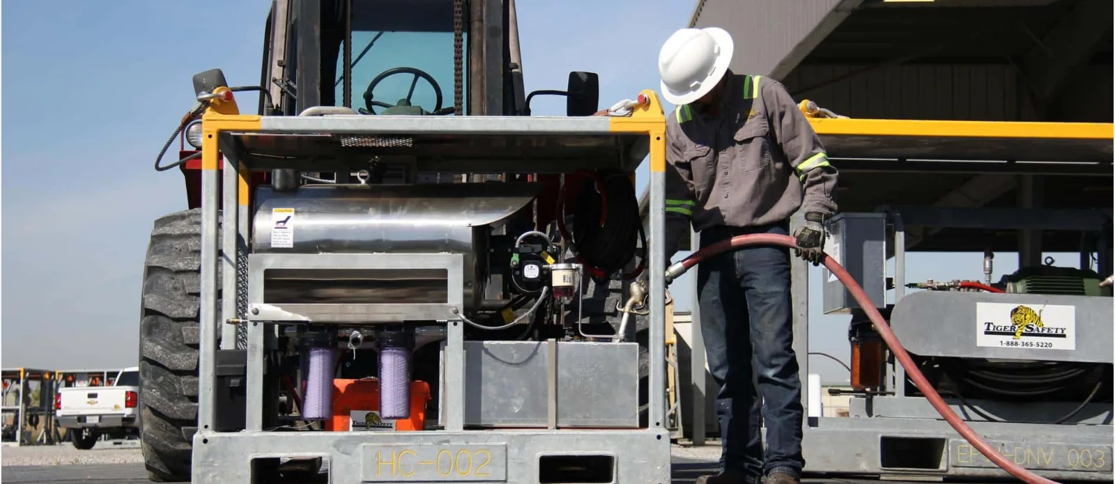 Tiger Safety Rentals technician servicing equipment in the Broussard yard